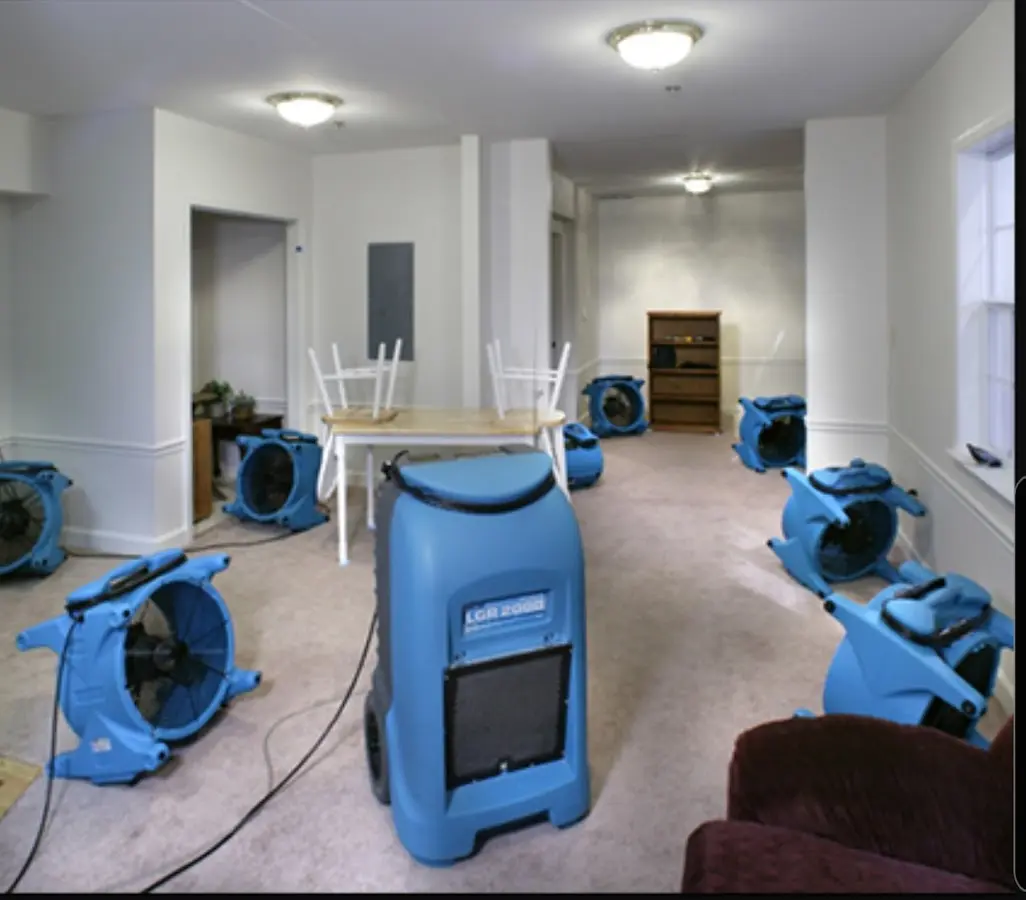 Air movers and dehumidifier setup for Water Damage Restoration in Lincoln City
